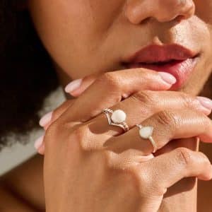 beaded breastmilk ring silver worn by model