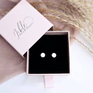 simplicity breastmilk stud earrings close up