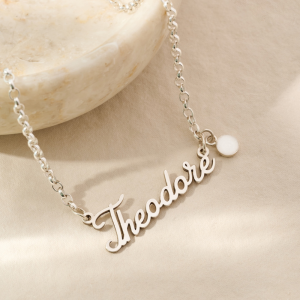Close-up Personalised Breastmilk Name Necklace featuring mini hanging milk stone.